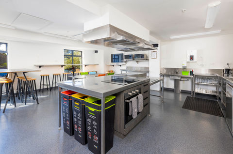 Christchurch accommodation photographer – Display Commercial Photography capturing shared kitchens, dining spaces, and communal guest areas for hospitality and accommodation branding.