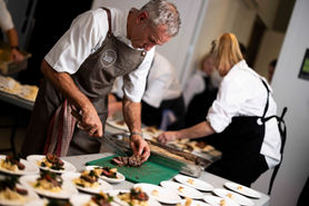 Chefs plating canapés at a corporate event in Christchurch – professional event catering photography by Display Commercial Photography.