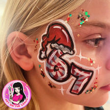 Christmas themed 67 face paint for private club party in Metairie, LA.