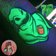UV blacklight glow face paint for glow party.