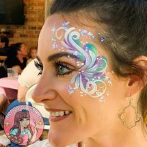 Swirl face paint design for a private party in Laplace, LA.