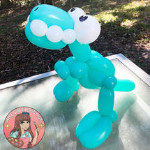Balloon animal t-rex for birthday party in Abita, Springs, LA.