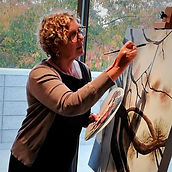 Adele working on one of her original artworks