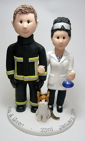 Fireman and Scientist with cat Bride and Groom wedding cake topper