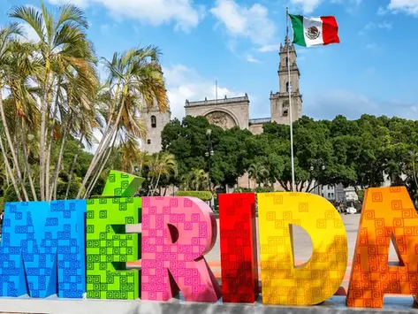 Colorful Mérida sign in the historic center, one of the top things to do in Mérida, Mexico for first-time visitors.