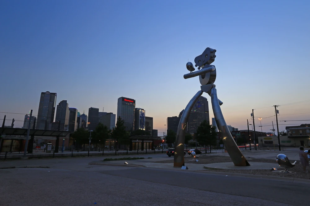 The DART Train Station is home to a three-part stainless steel sculpture series called The Traveling Man.