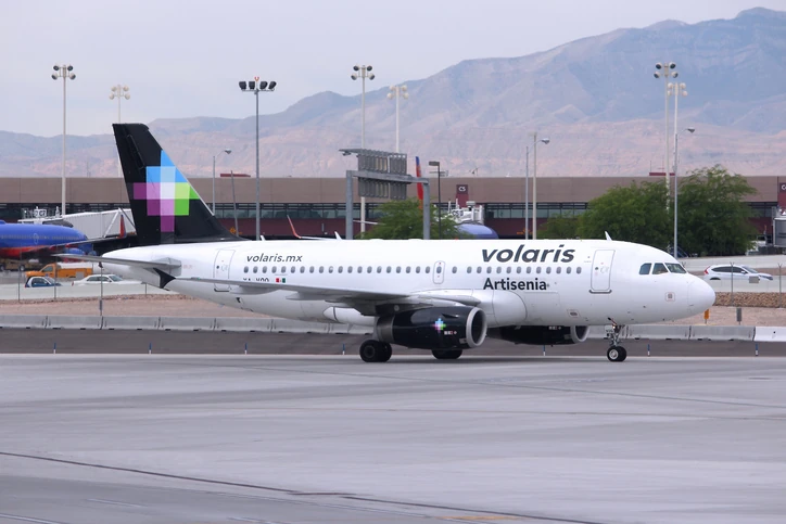 Volaris airbus "Artisenia" at the airport platform.