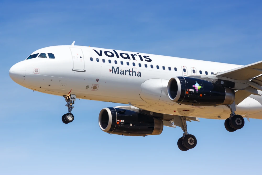 Front side of Volaris airbus “Martha” initiating landing in the sky.
