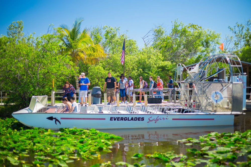 People aboard an airboat tour at Everglades National Park.