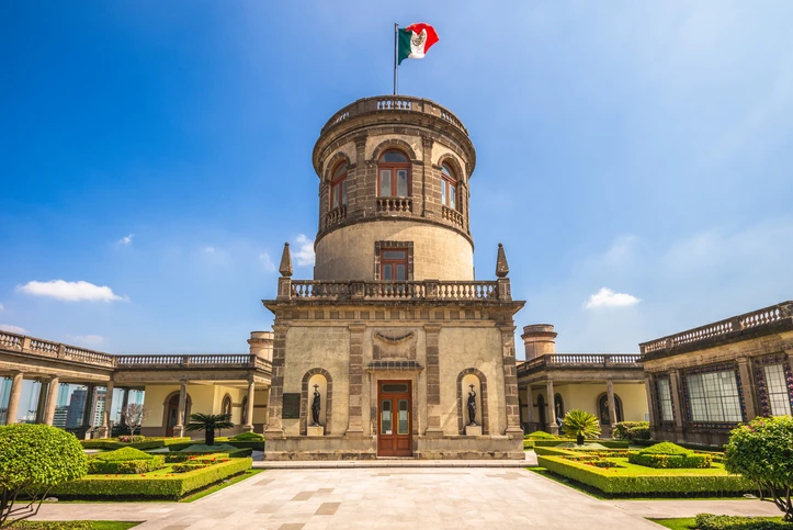 One of the towers of Chapultepec Castle, with the Mexican flag on top.