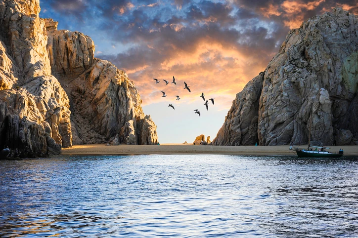 Cliffs at San Jose del Cabo’ seas and birds flying during the afternoon.