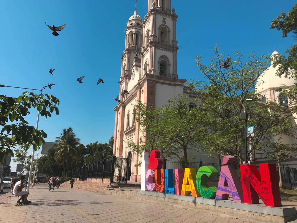 Cathedral Basilica and colorful sign of Culiacan at the historic core.