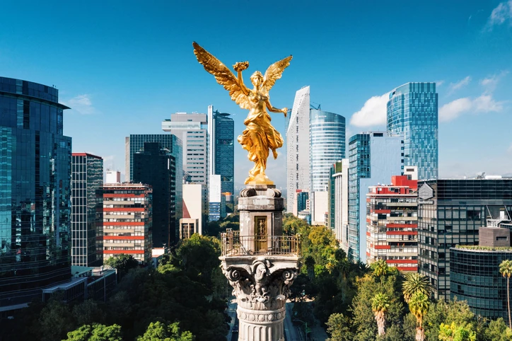 Angel of Independence statue, one of the most iconic landmarks of Mexico City surrounded by modern buildings.