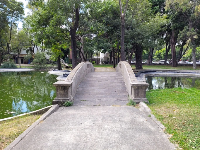 A walking bridge at Los Colomos Forest.