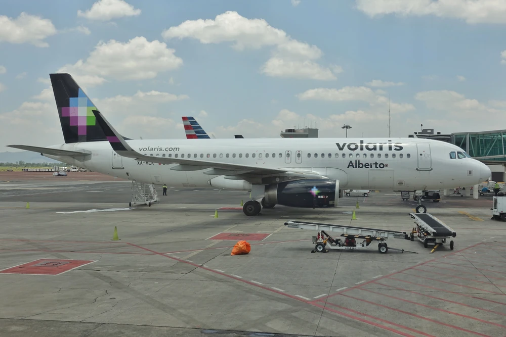 Volaris airbus “Alberto” in the airport platform.