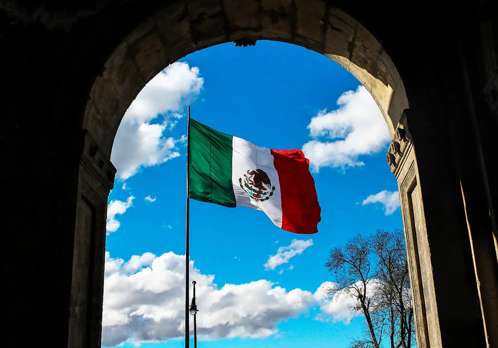 Mexican flag seen through Monument of the Revolution in Culiacan, Mexico.