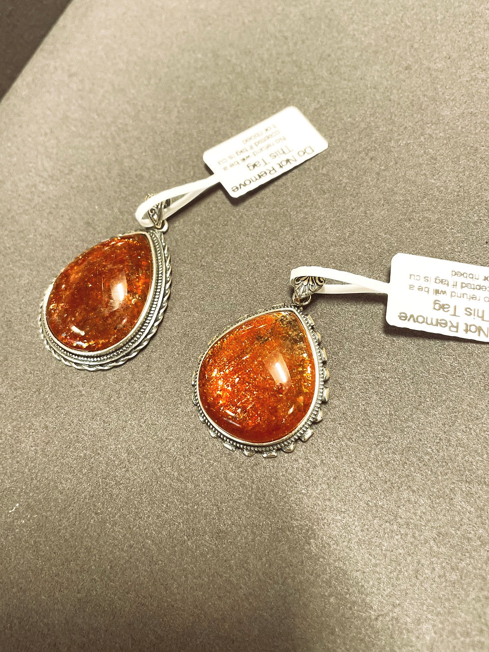 Thumbnail: Sun stone pendant