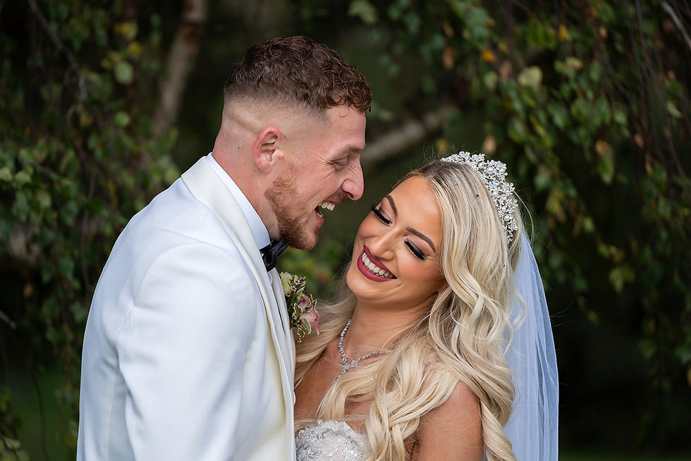 Bride and groom laughing