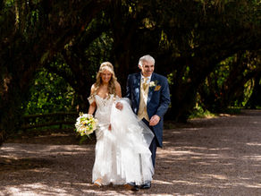 Casual natural photography of bride and groom walking
