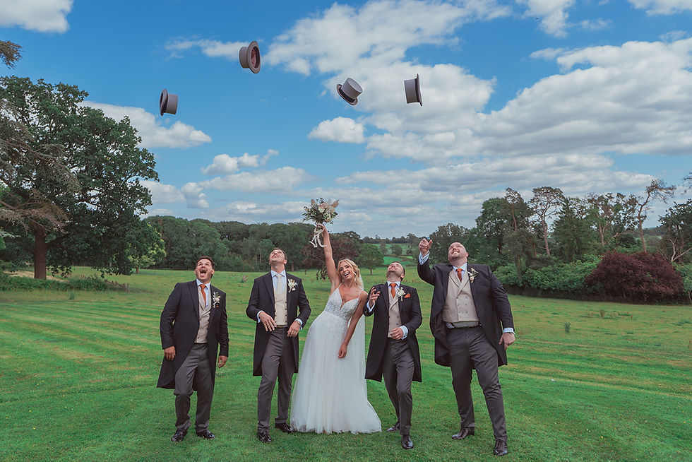 Wedding videographer filming couple at ceremony