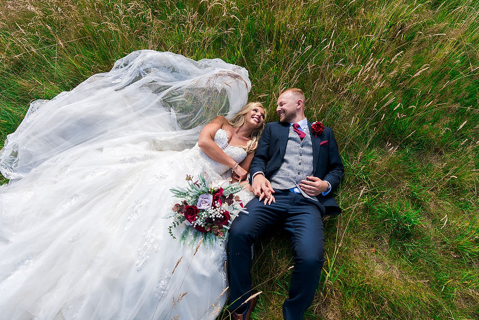 Bride and groom candid outdoor wedding moment