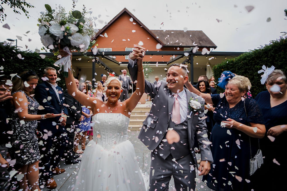 Photographer removing memory card after wedding