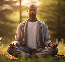A black male age 45 meditating in the middle of the forest and the sun is coming up