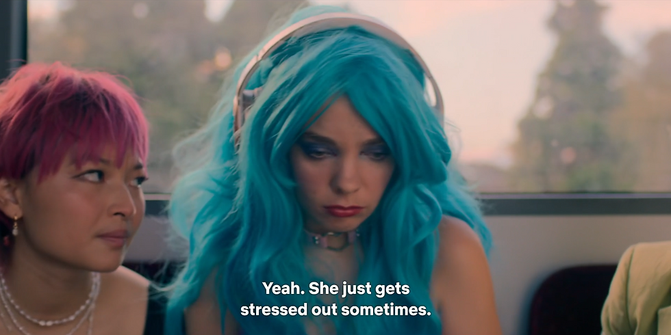 Quinni is still centred in frame, looking down, upset. Sasha looks towards jules with a solemn expression. Subtitle, spoken by Sasha, read: Yeah. She just gets stressed out sometimes.