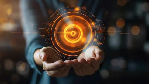 hands-holding-virtual-bullseye-target-business-goals-representing-focused-objectives-strat