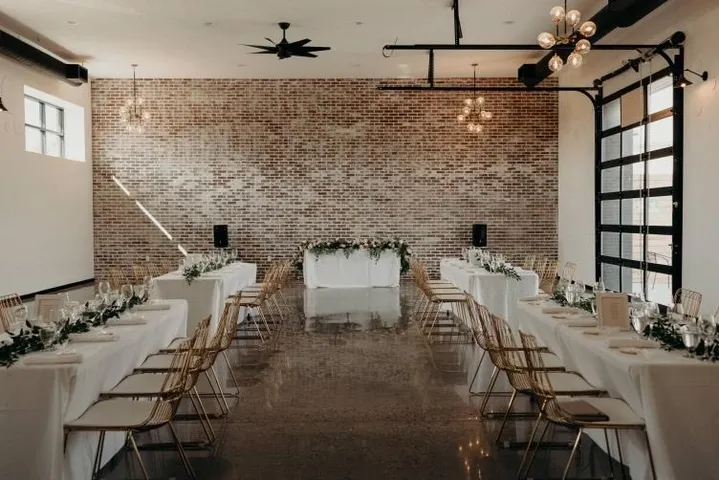 Dinner tables set up for a wedding reception at Storehouse 408 located in Cambridge Ontario