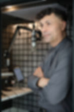 Daniel in his recording booth