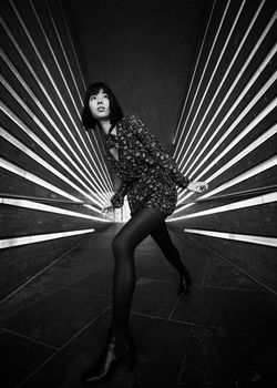 Black and white fashion photoshoot with Japanese model in modern architecture, new york city.