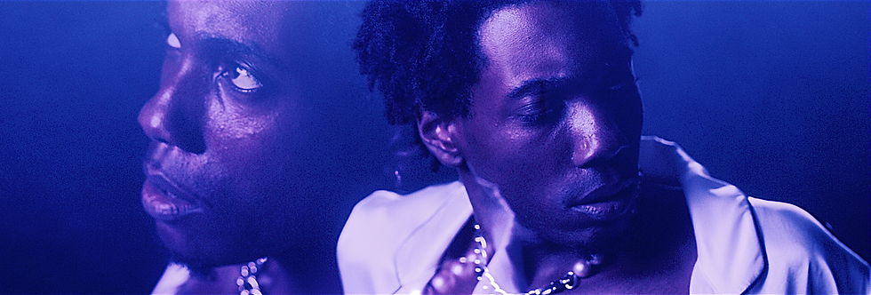 A close up of singer Dwn2Earth