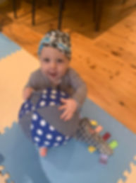 Baby_Holding Large Balloon Ball.jpg