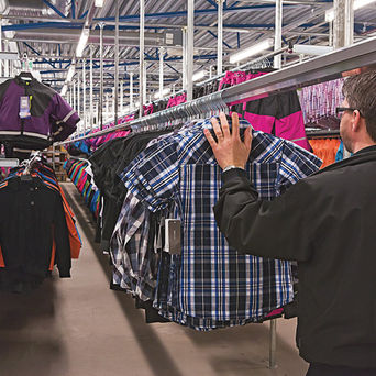 Autopak slick rail system conveyor system hanging garment storage 