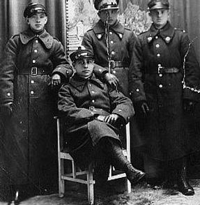 Menashe Pizer, Michael's brother [front seated] in the Army. Przeshnev, Poland. c.1931