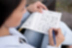person-playing-sudoku-game-alone.jpg