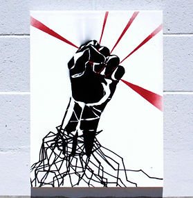 spray painting depicting a stylized fist being raised from the bottom left with red rays beaming out between the gaps in their fingers. the lower arm is wrapped up and composed of abstract, rigid lines scraggled from the bottom of the frame.