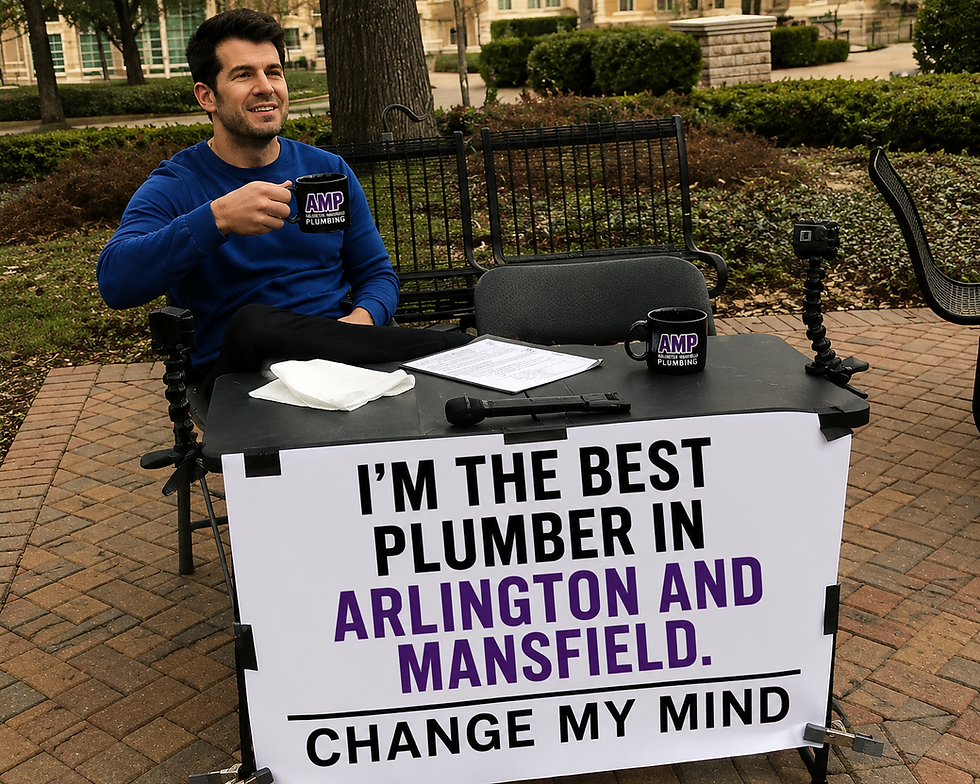 Man at a desk with sign: I'm the best plumber in Arlington and Mansfield. Change my mind.