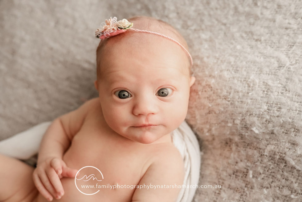 newborn baby wide awake and looking to camera during photography session in Brisbane with Natarsha March