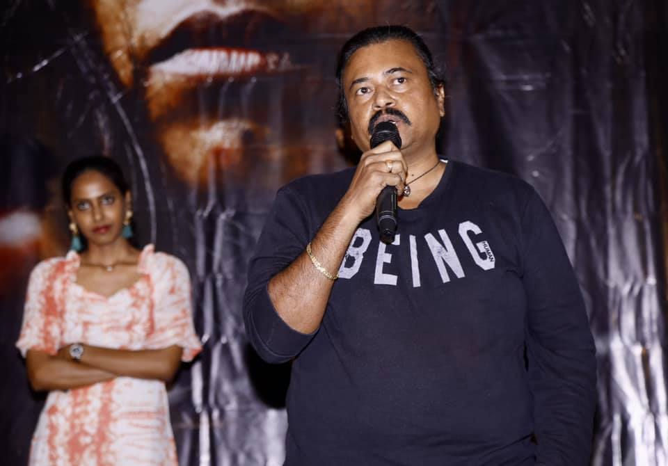 Harinath Babu speaking about the Bhumi, short film. Behind is Naziya Sheik, actress