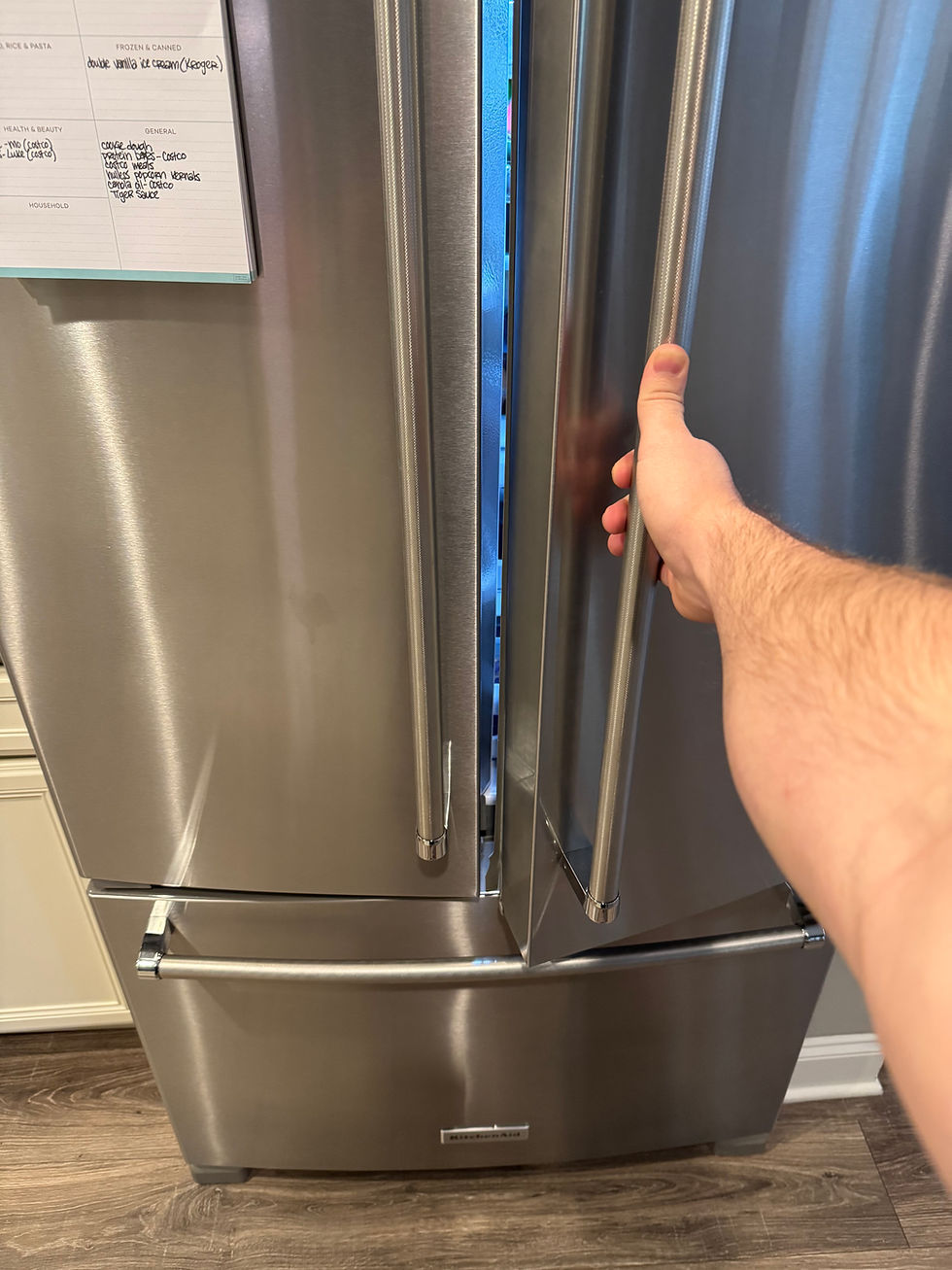 Opening a refrigerator door