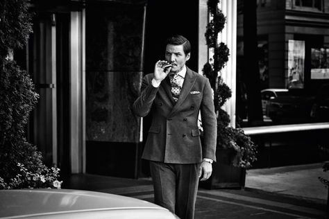 Pedro Pascal for The Rake magazine in a suit. Black and white photo