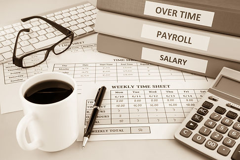 Human resources documents_ payroll, salary and employee time sheets place on office table
