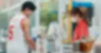 Image of a man and women at a POS system