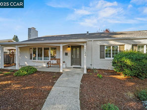 Front exterior of 134 Oxford Dr Moraga California single-family home purchased by first-time relocation buyers.