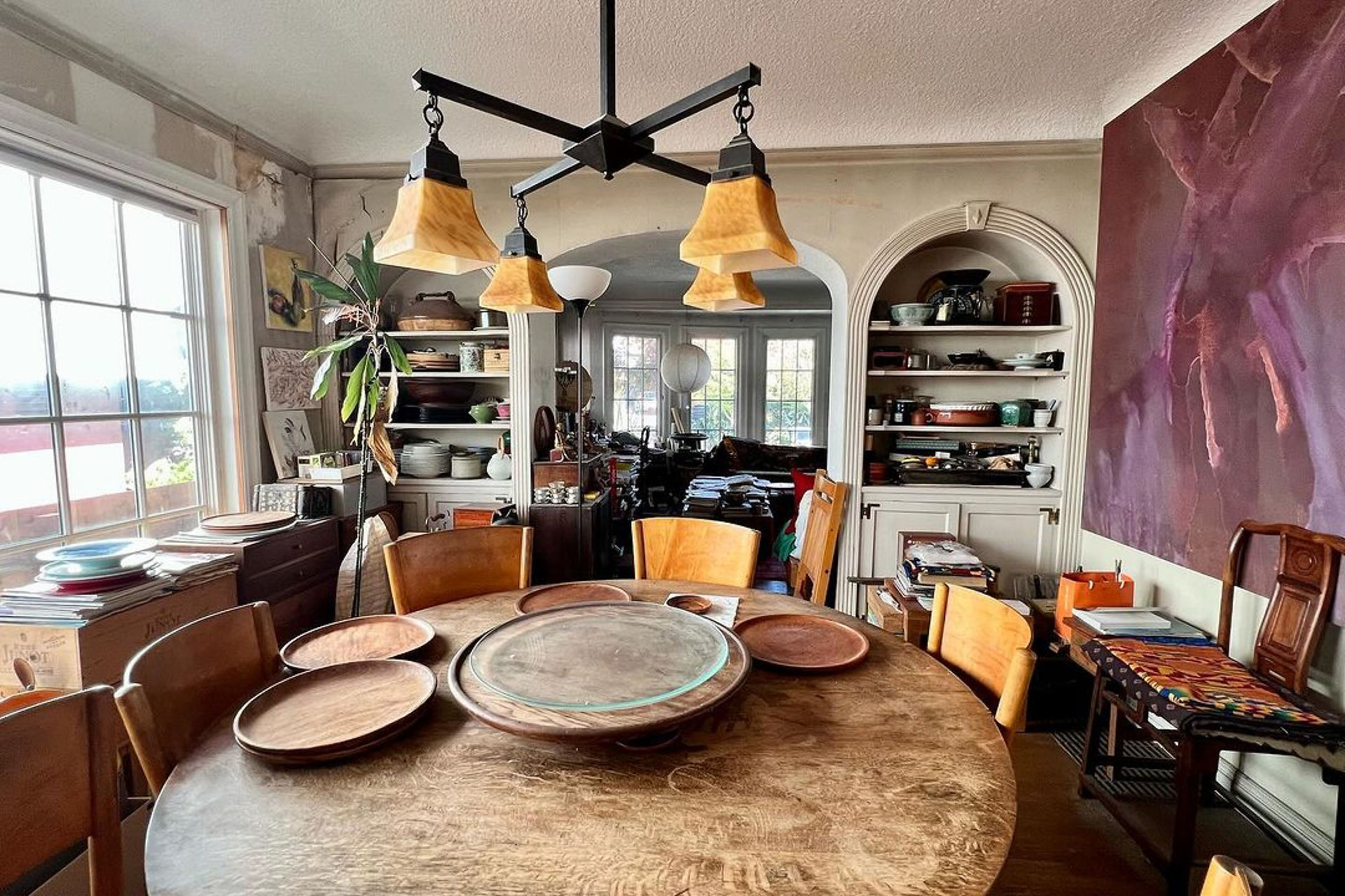 Before and after transformation of 1518 Josephine St in Berkeley, showing how Compass Concierge updates—like a new roof, kitchen remodel, and staging—helped the home sell significantly over asking.