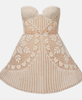 Magda Butrym crochet cotton bustier dress featuring a sculpted sweetheart neckline, form-fitting bodice, and intricate open-knit detailing, combining feminine silhouette with elevated artisanal craftsmanship.