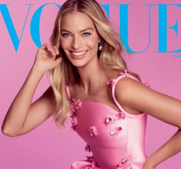 Margot Robbie with glowing, porcelain skin and classic Hollywood waves, radiating effortless elegance and a fresh, dewy complexion.