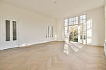 vecteezy_an-empty-room-with-white-walls-and-wooden-floors_50376865.jpg